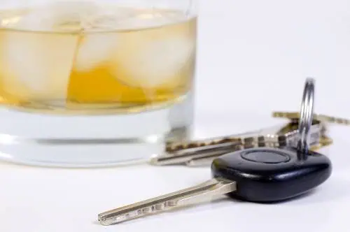 DUI Facts car keys next to whiskey in glass