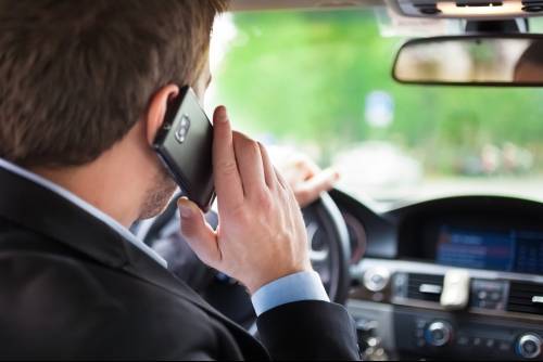 Driver with Cell Phone