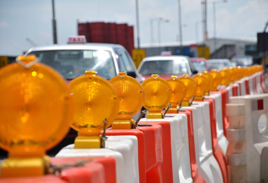 Cars driving in a work zone