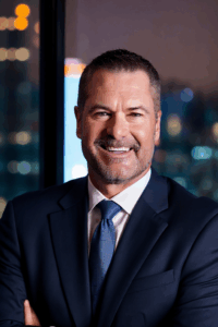 John B. Shook - Partner