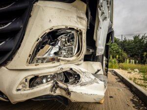 A crashed front-end of a semi-truck. Can I sue a trucking company if I’m hit by one of their drivers?