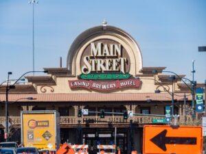 Main Street Station Casino Brewery Hotel building with construction signs in the foreground on a sunny day.