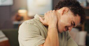 A man holding his head after a mild traumatic brain injury. How do you prove it in court?