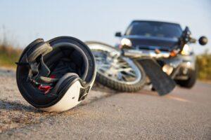 A helmet on the ground next to a crashed motorcycle. What if I wasn’t wearing a helmet during a motorcycle accident?